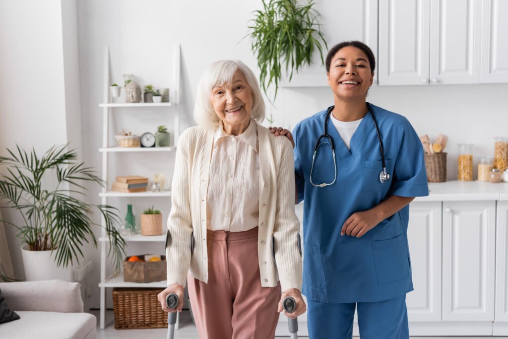A caring professional supporting an older adult at home